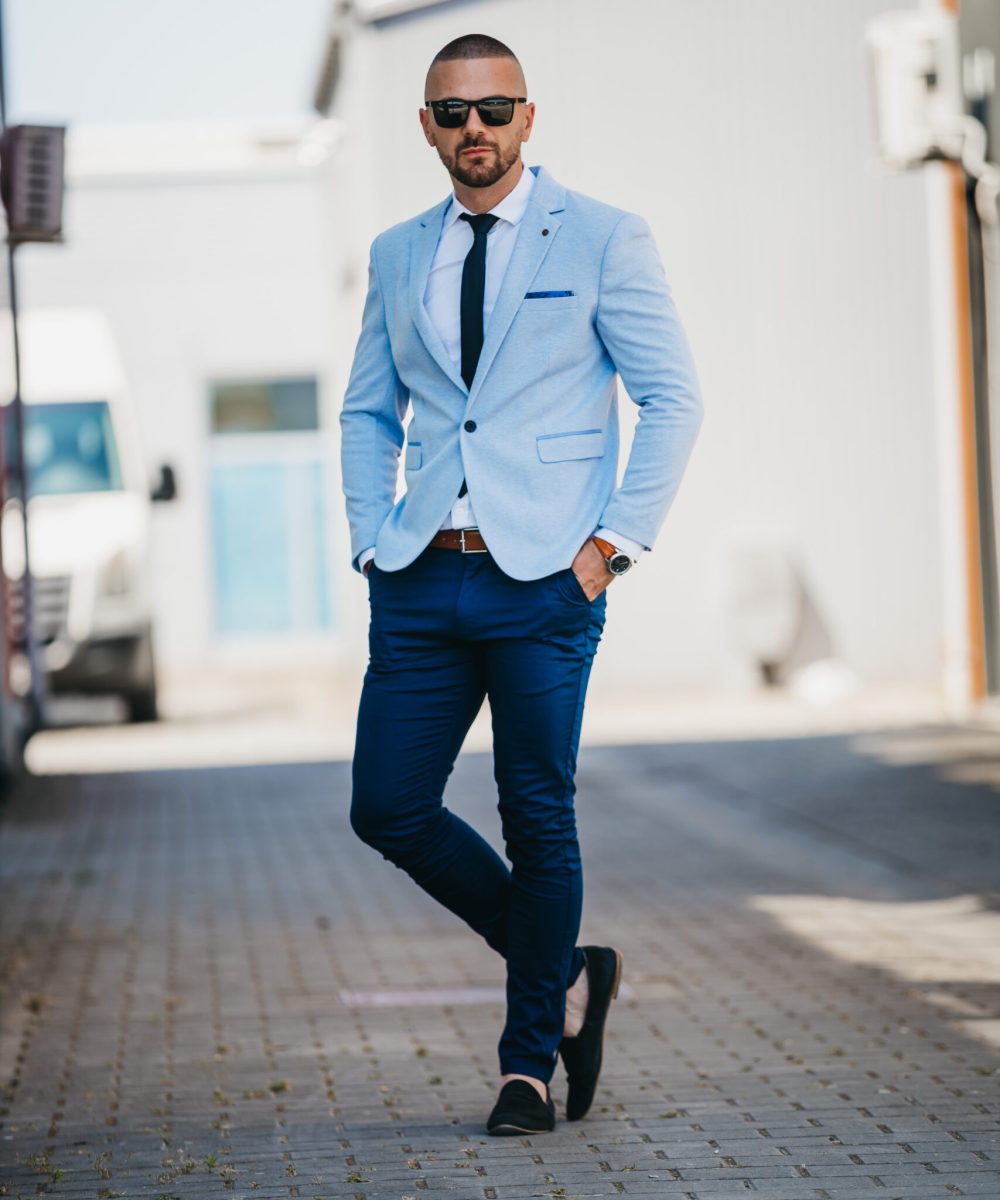 A vertical shot of a young caucasian businessman